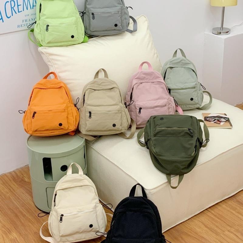 Casual backpack niche cute student bag versatile travel new sports lightweight backpack