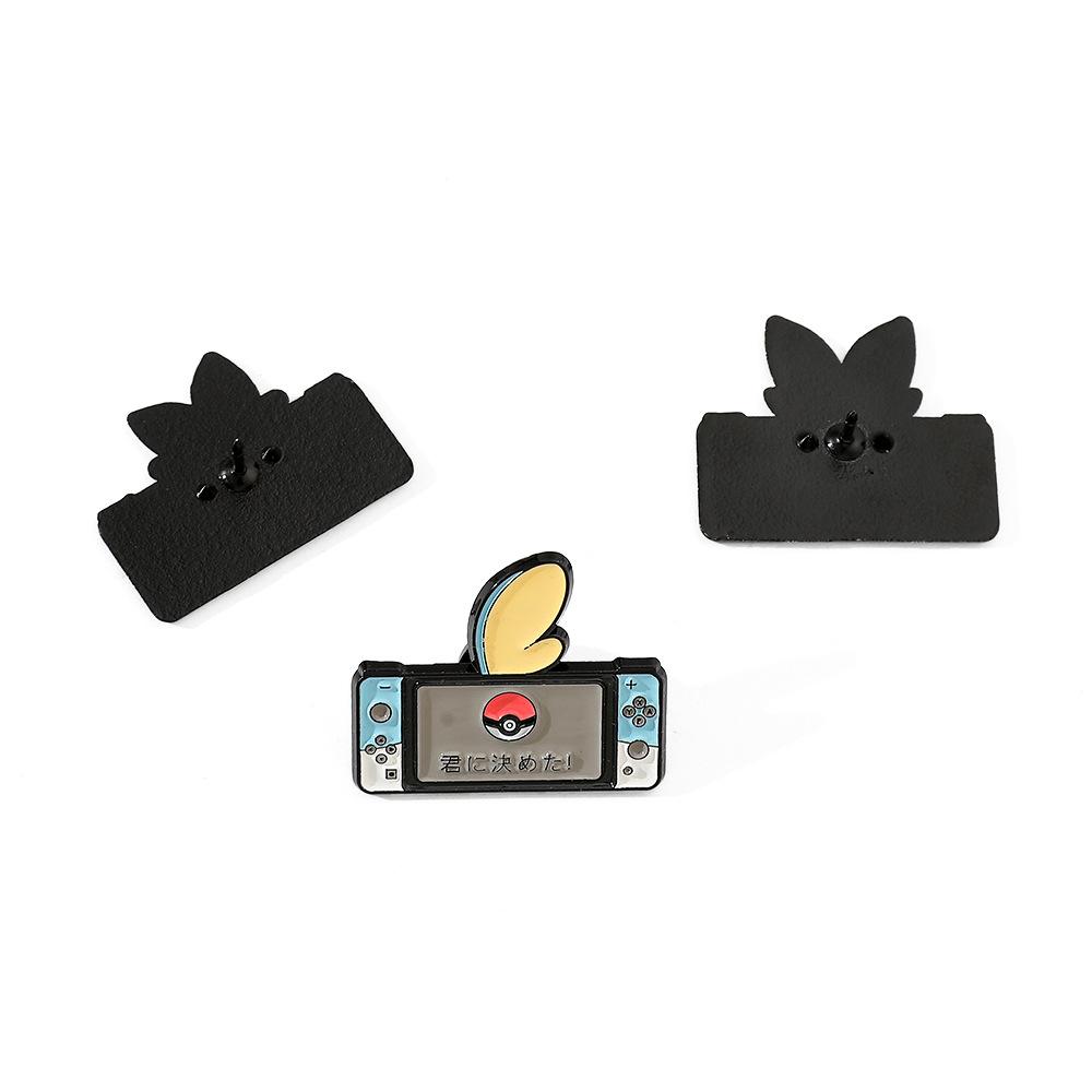 Japanese cartoon creative game console shape Pokémon metal badge Pokémon elf ball brooch