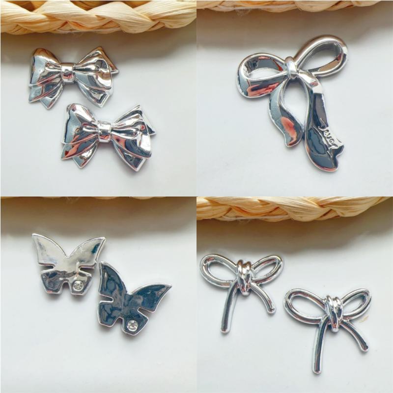 10/18Pcs Diy Hole Shoes Charms Electroplated Silver Bow Tie Accessories Designer Garden Shoe Decoration Girl Gift