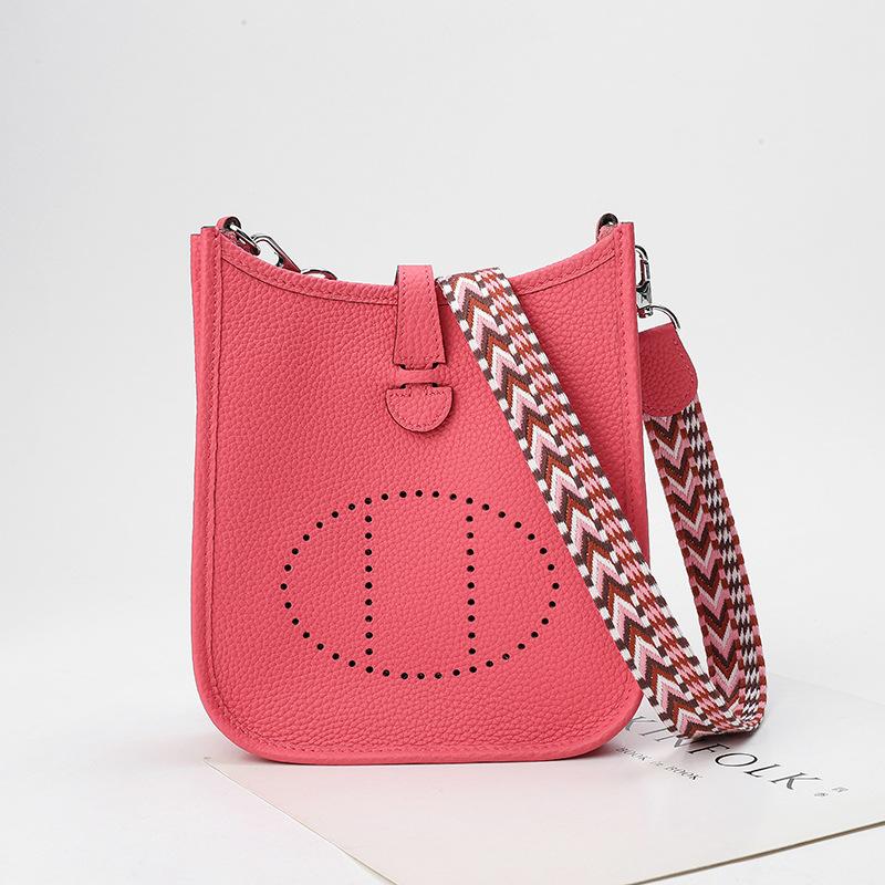 Factory wholesale first layer togo cowhide bucket bag women's bag lychee pattern hollow single shoulder crossbody bag hollow design