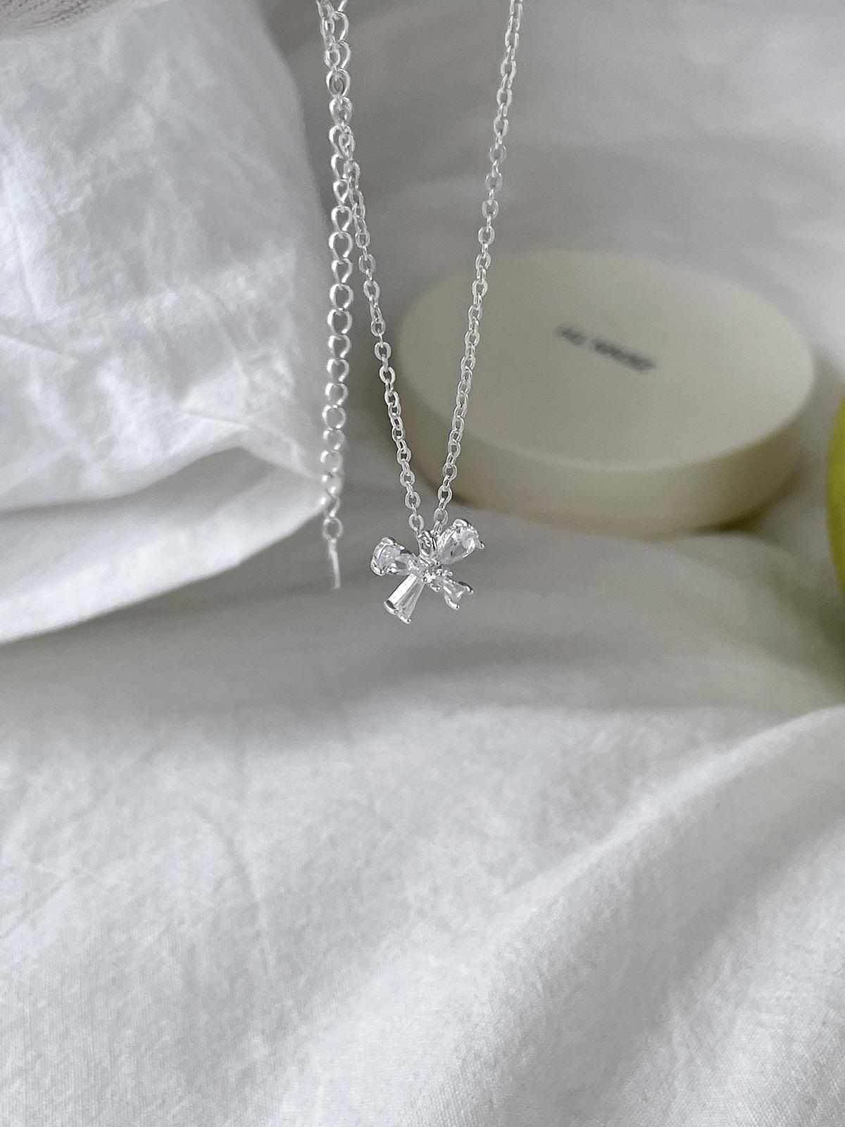 

S925 sterling silver minimalist wind inlaid zirconium bow necklace female minimalist personality INS wind small fresh neck chain 925 silver