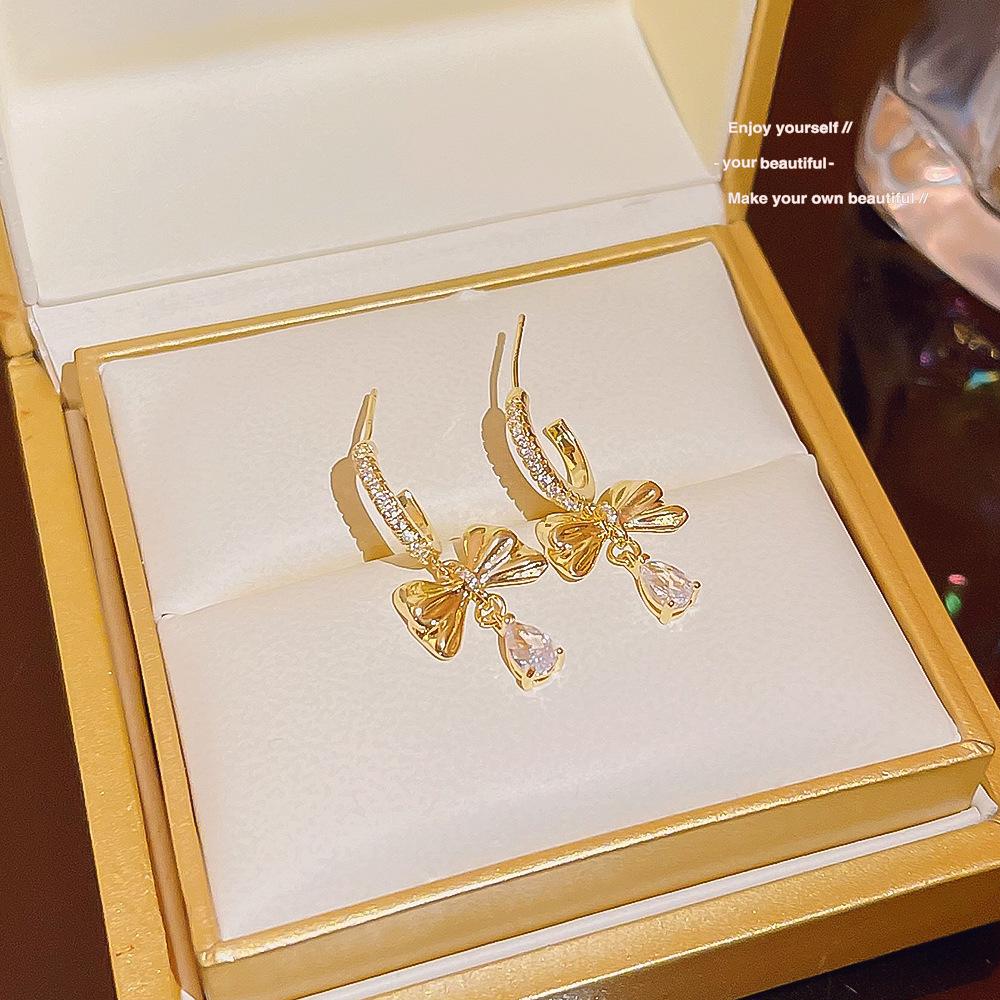 

Exquisite Bow & Water Drop Micro-Paved C-Shaped Earrings - Trendy, Luxurious, and Versatile