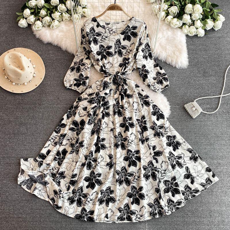 

Sexy V-neck Floral Dress Women s Clothing Summer Small Waist-Tight Slim Looking French Fancy Age-Reducing A- line Skirt Black Print on white background One size