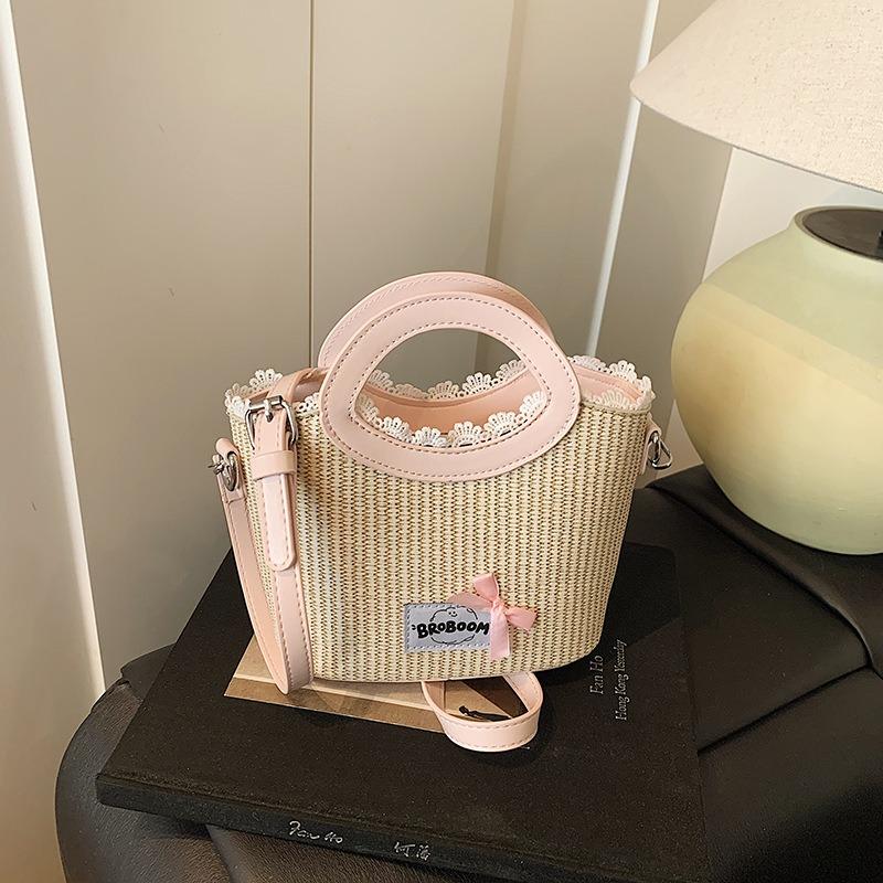 

Personalized versatile niche design woven bag women s bag summer new seaside vacation beach bag hollow straw bag рожевий