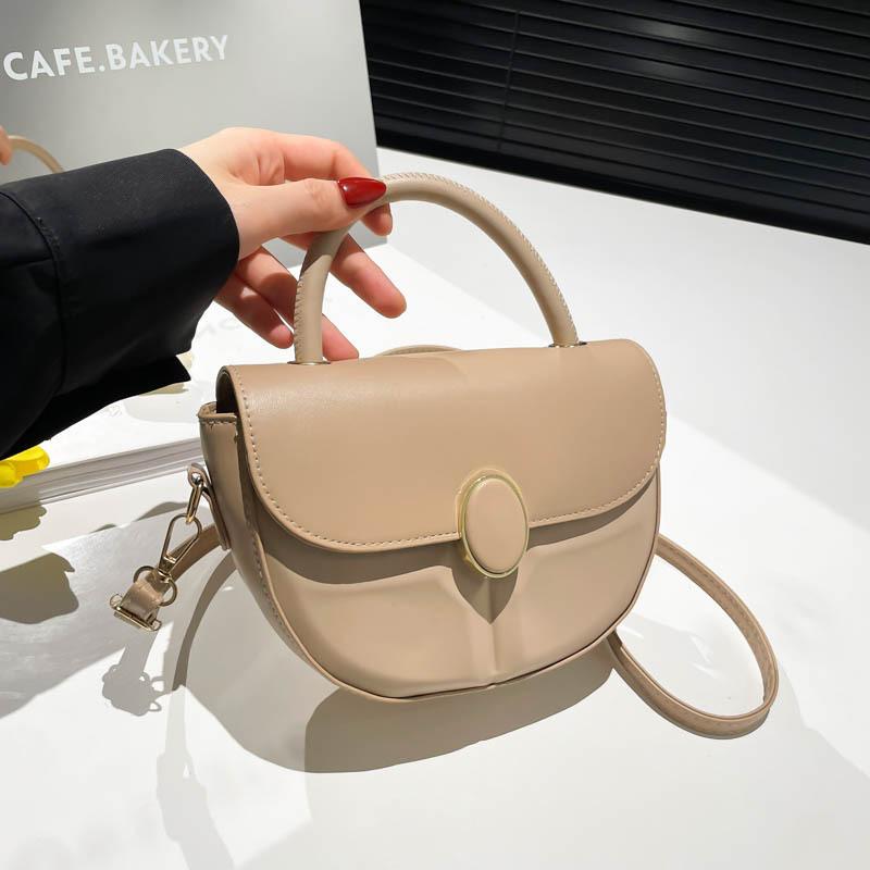 Women's bag new trendy high-end fashion niche design solid color retro messenger bag portable saddle bag