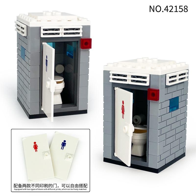 Children assemble toilet blocks, scenic public toilets, small accessories, wild animal cages, educational toy sets.