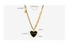 Chic Minimalist Women's Peach Heart Pendant Necklace: European & American Style, Sexy Layered Design with Drip Oil & Steel Beads
