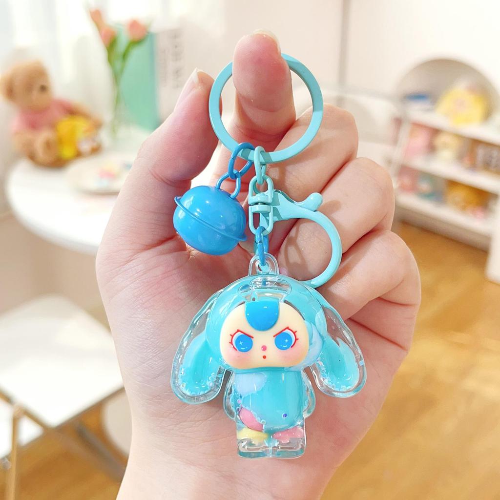 Super Cute 3-Year-Old Cartoon Doll Keychain with Flowing Sand Pendant