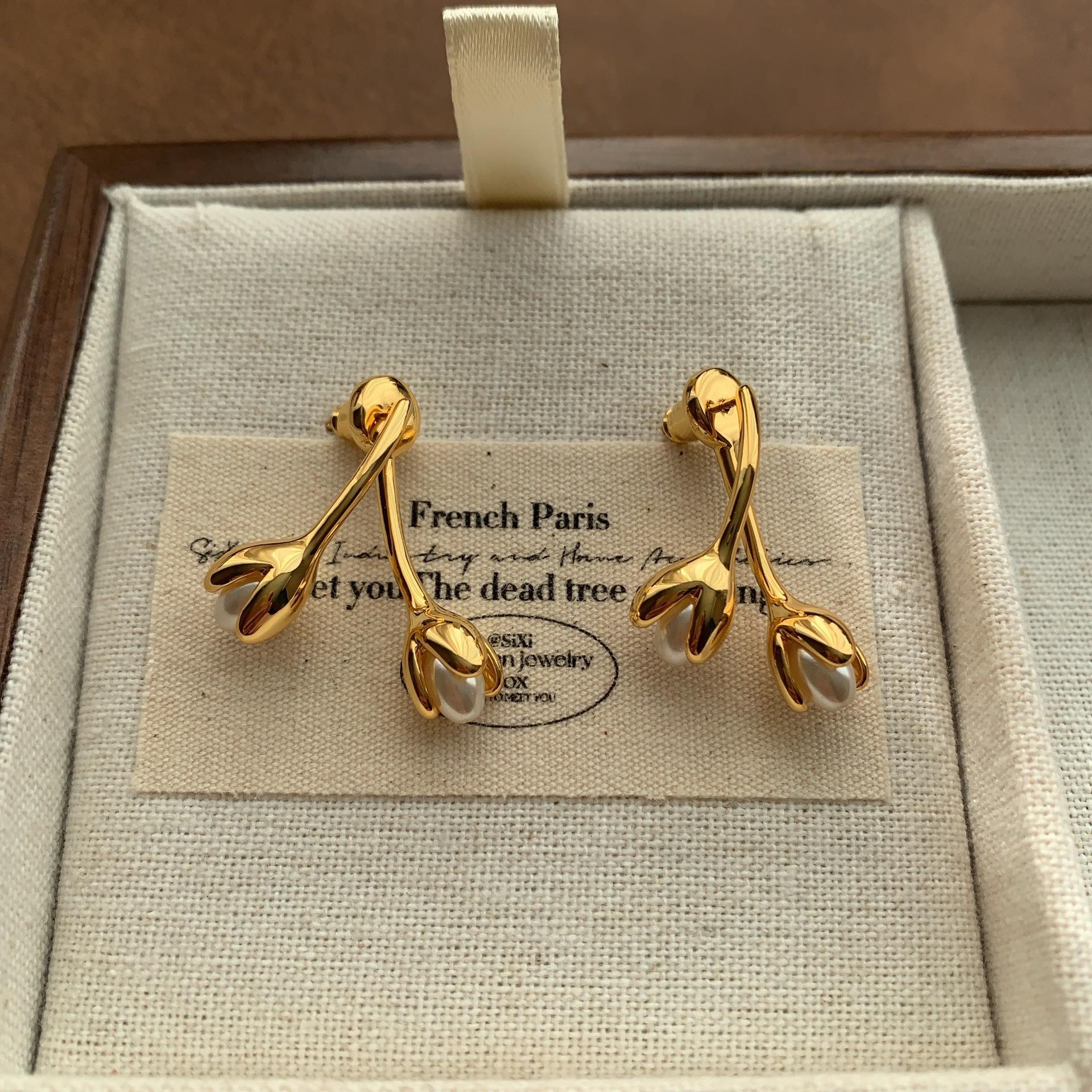 

Simple bud flower stem pearl earrings earrings light luxury exquisite fashion high texture personalized French gentle earrings