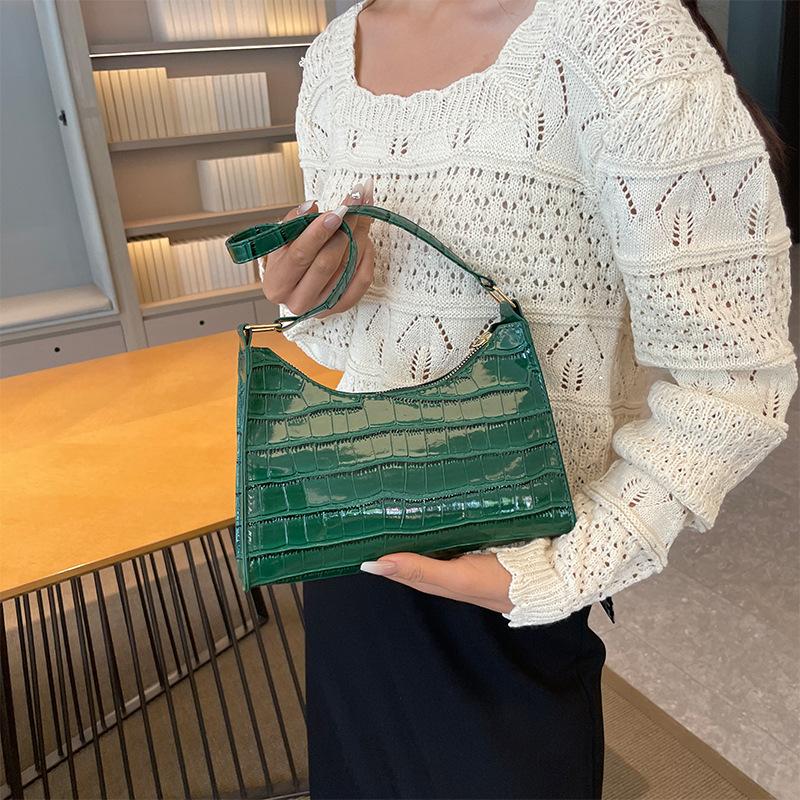 French niche bag women's 2026 new fashion solid color underarm bag texture portable shoulder baguette bag