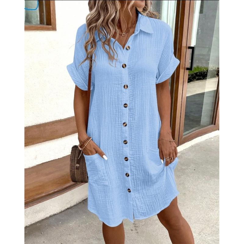 A Simple White Shirt Skirt, Made of Breathable Cotton, with A Streamlined Collar Design and Orderly Button Arrangement, Adding A Vintage Charm