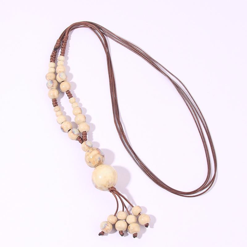 Lång vävd etniskt stil halsband mångsidigt dam handgjort kalebass keramiskt halsband högtidsgåva hänghalsband