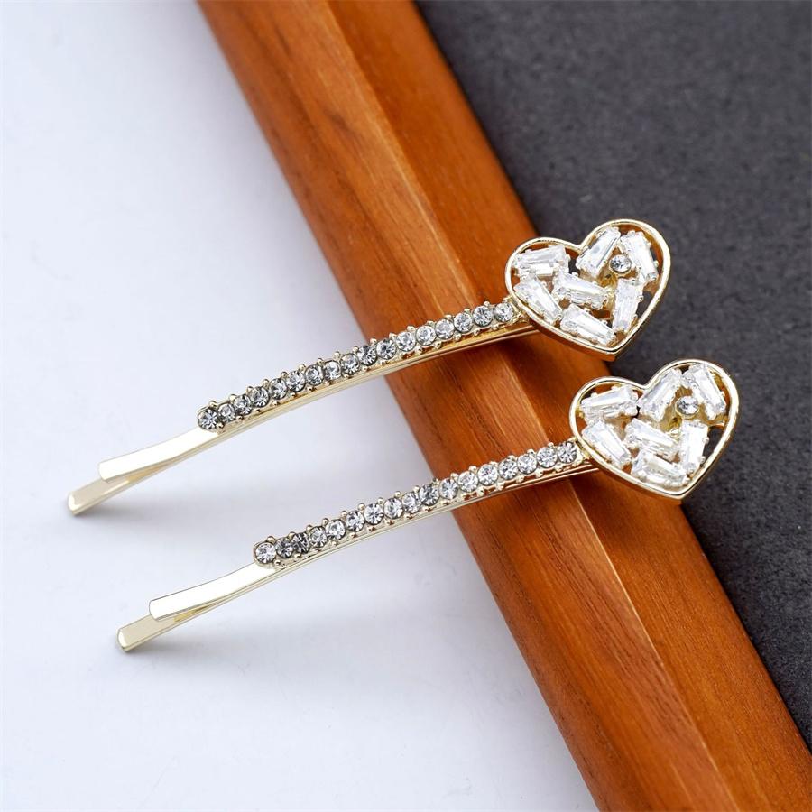 

Новые корейские хрустальные заколки для волос, темпераментные, со стразами, из легкого сплава, элегантные женские аксессуары для волос, заколка-слово, инструмент для укладки