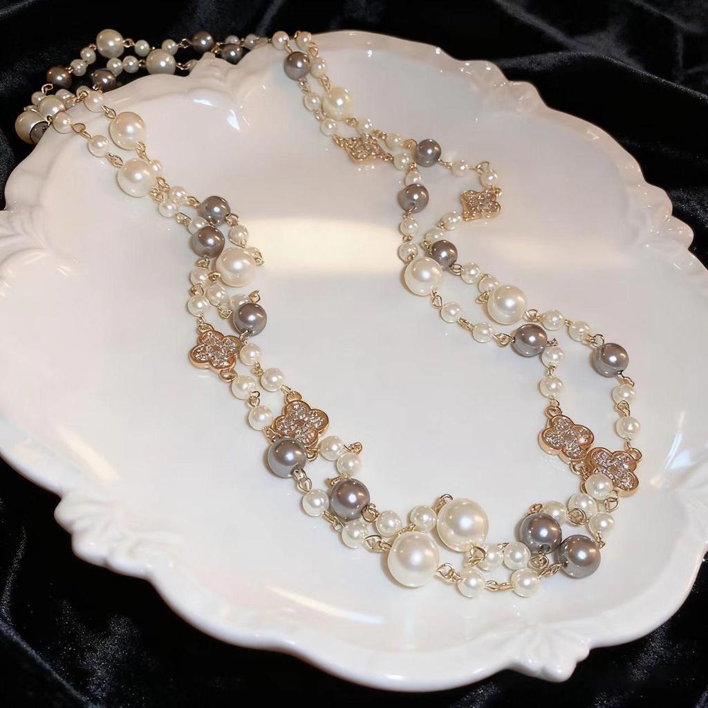 Korean Fashion Pearl Necklace: Elegant Rose Pendant, Versatile Multi-Layer Design, Long Style.