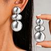 Boucles d'oreilles exagérées en métal lisse européennes et américaines boucles d'oreilles géométriques rondes irrégulières boucles d'oreilles haut de gamme en stock