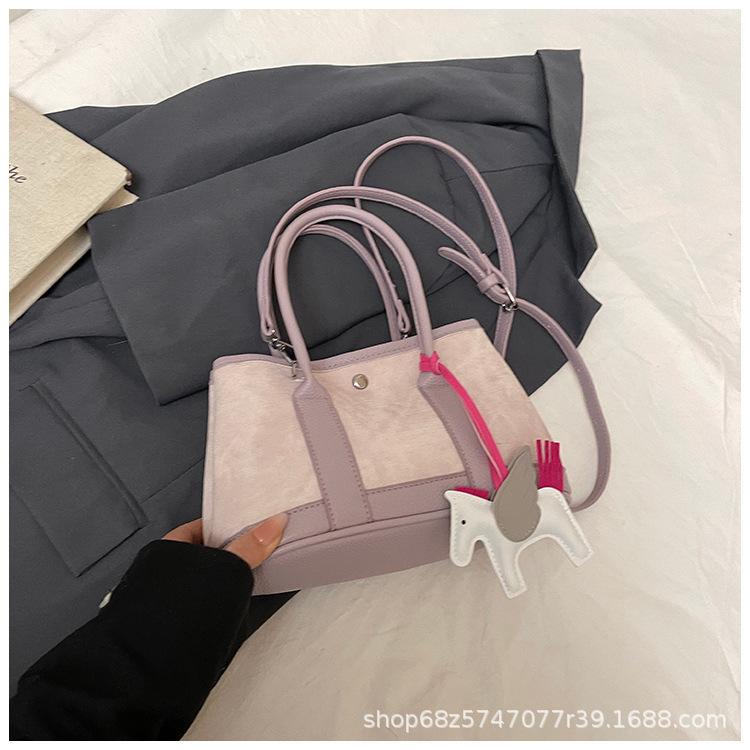 

2025 new niche design handbag large capacity canvas contrasting color tote bag commuter shoulder messenger bag women фиолетовый