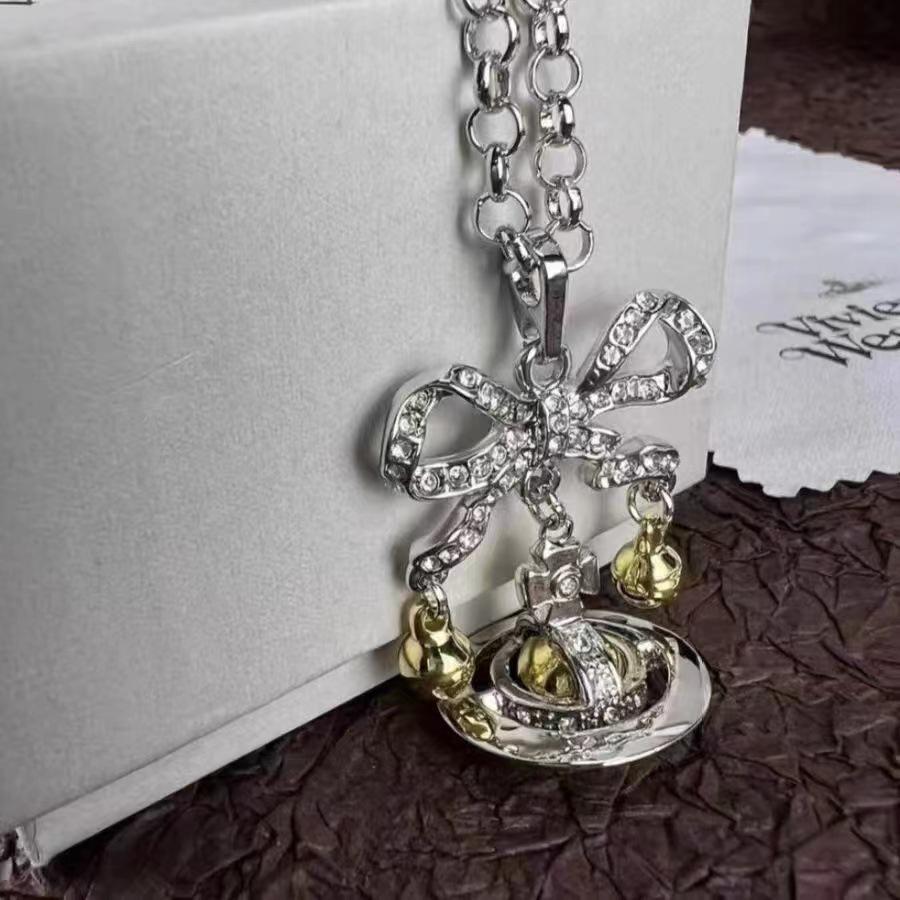 Kaiserinwitwe Cixi Silberne Weihnachtsklingel Brosche & Halskette mit Saturn-Schleife - Eleganter High-End Schmuck für Damen