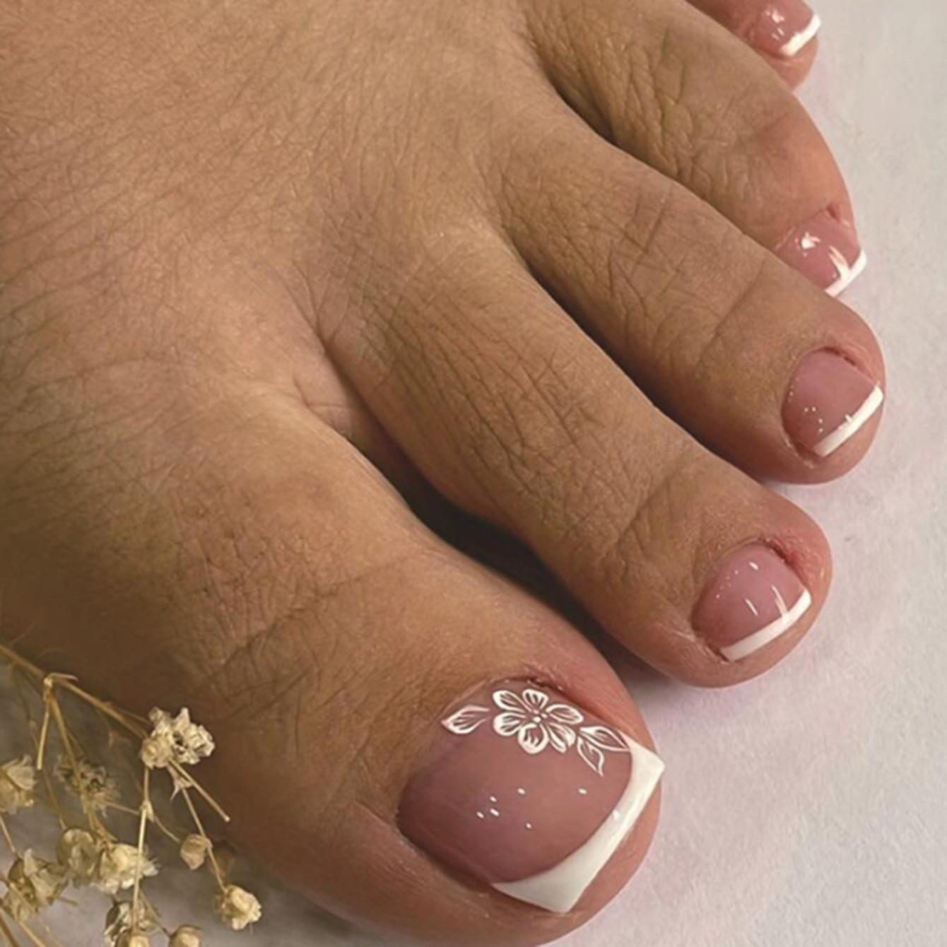 

24Pcs Press On Toenails, Nude Pink with White French Tips & Flower Print Full Cover Fake Toenails United States