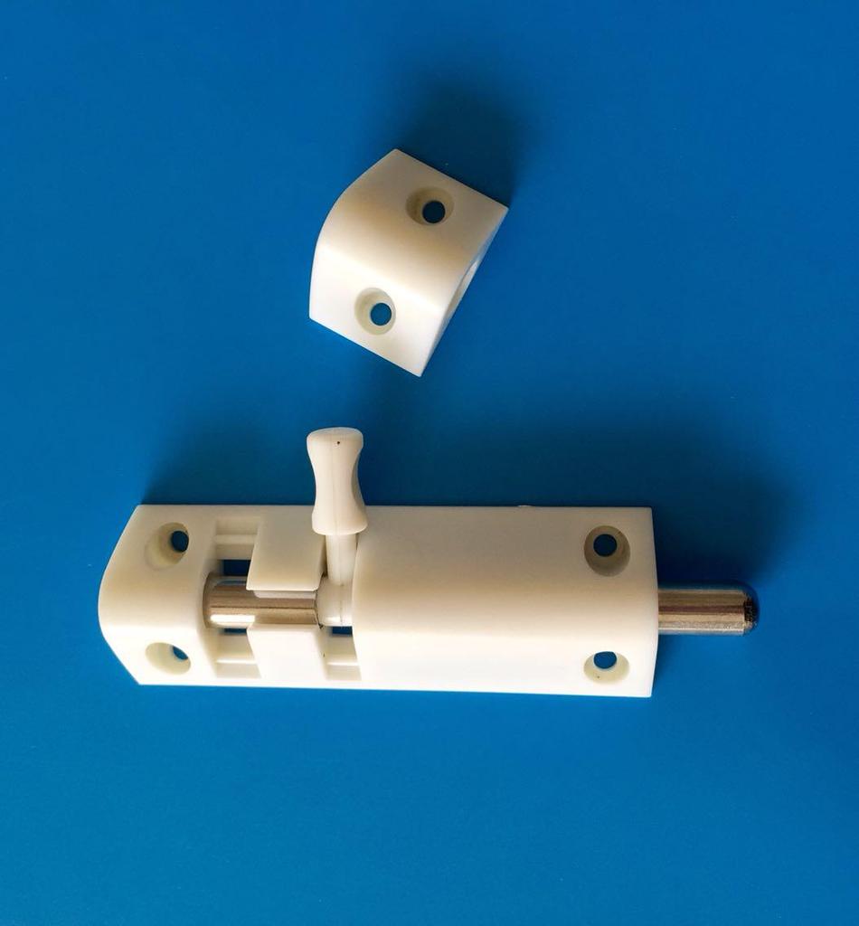 White Wooden Door with Plastic Window Bolt: Large Household Hardware Accessory.