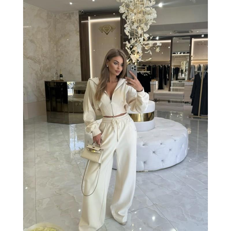 Completo casual da donna in due pezzi: Felpa corta con cappuccio e zip Pantaloni a gamba larga con coulisse