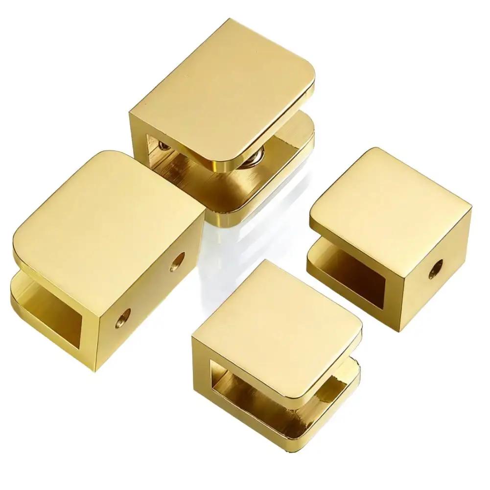 Glasklämma i mässing för badrumshyllor, vinskåp och vitrinskåp. Stöd med säker glaslåsfunktion.