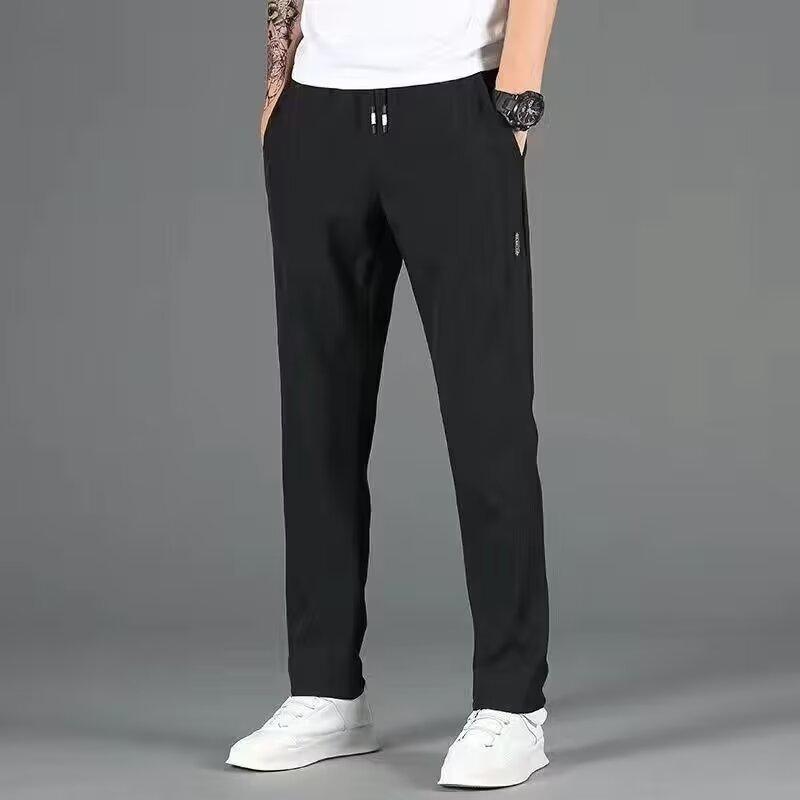 Summer new men's breathable elastic casual pants loose fashion comfortable trend straight sports long pants