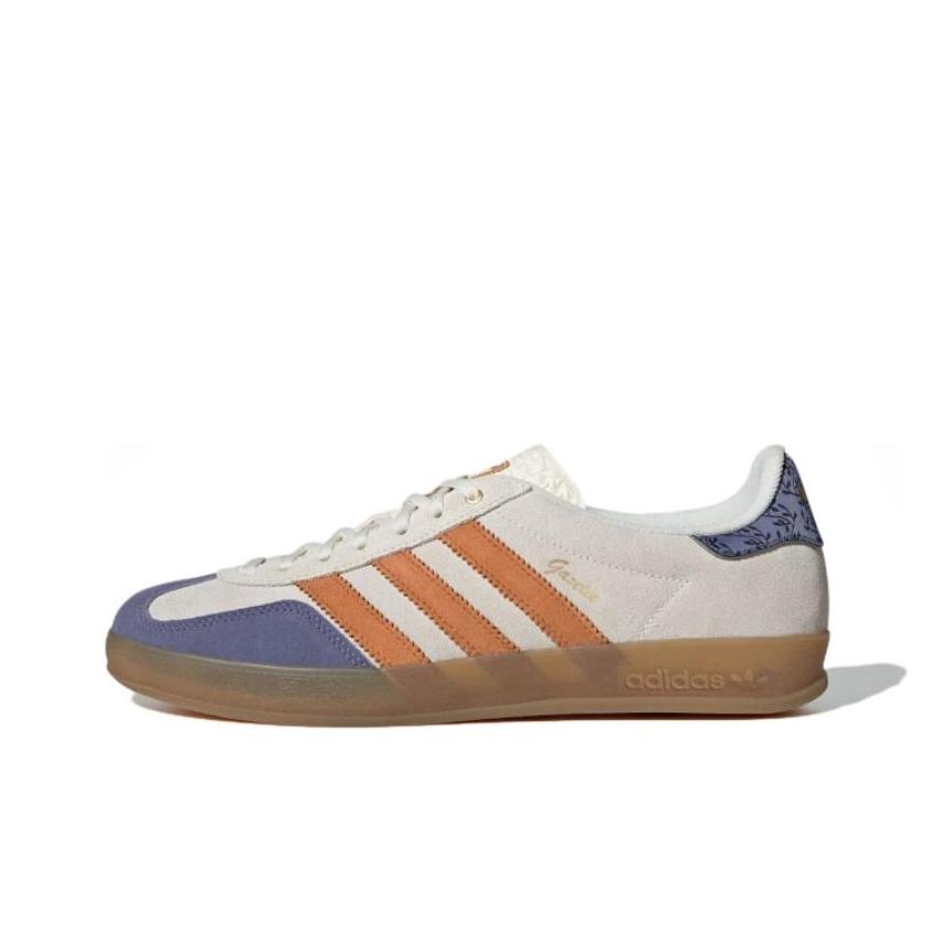 

Adidas Кроссовки унисекс Gazelle Indoor кремово-синие с оранжевой лозой JQ0956 EU 35.5 разноцветный