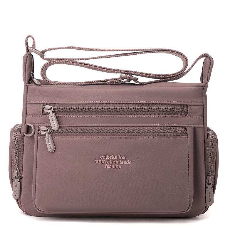 Ny dam stor kapacitet axelväska flerlagers stänkskyddad nylon budväska