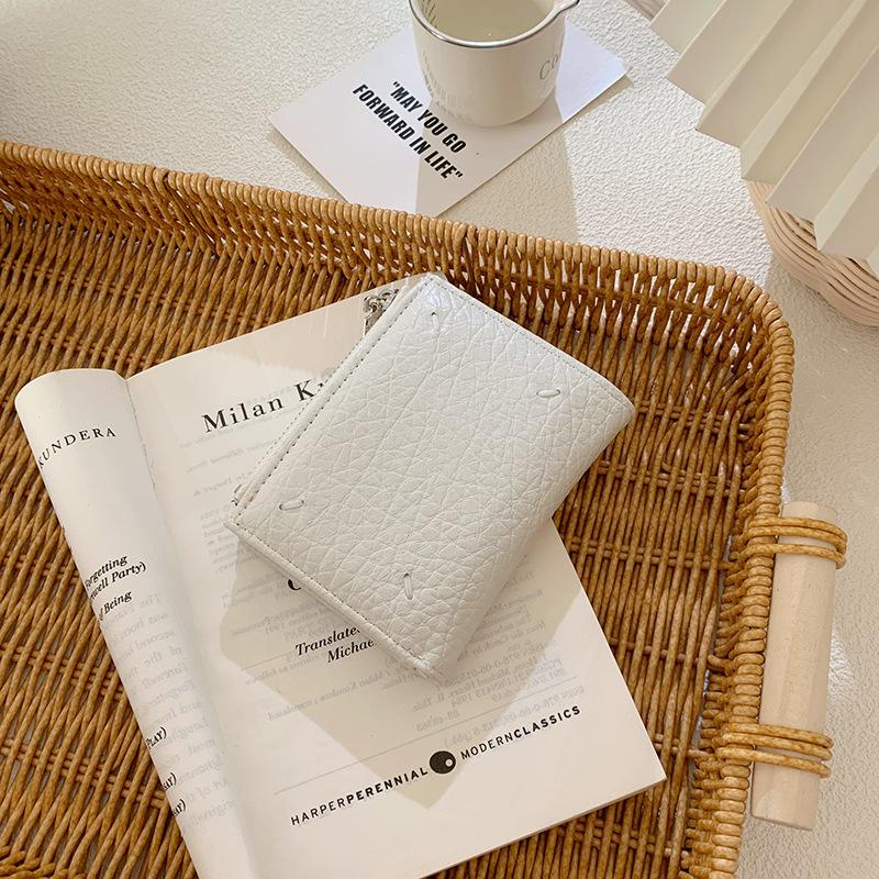 Korean version of women's wallet ins women's small wallet women's high-end short wallet change bag solid color zipper hand-held