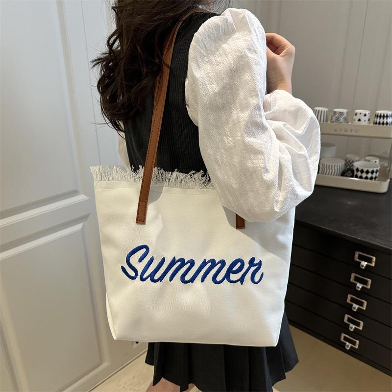 New Letter Tassel Canvas Bag Women's Versatile Largecapacity Simple Commuter Student Shoulder Tote Bag