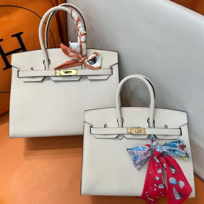 Two-layer EP Palm Pattern Leather Color Matching Platinum Bag (H13-2530BK)
