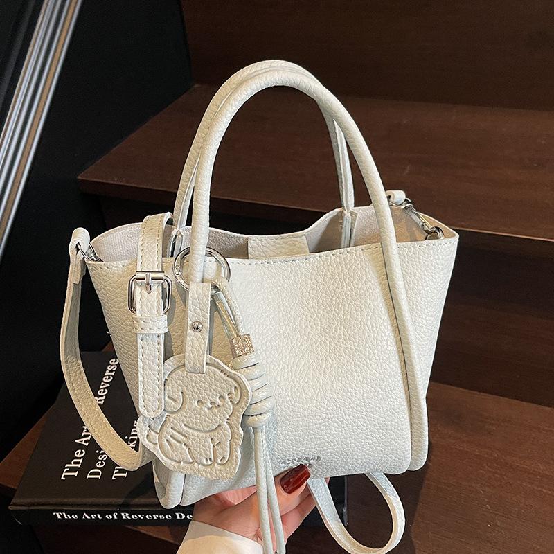 Korean Version Niche Casual Simple Lychee Pattern Portable Bucket Bag Temperament Versatile Commuter Child and Mother Messenger Bag Woman