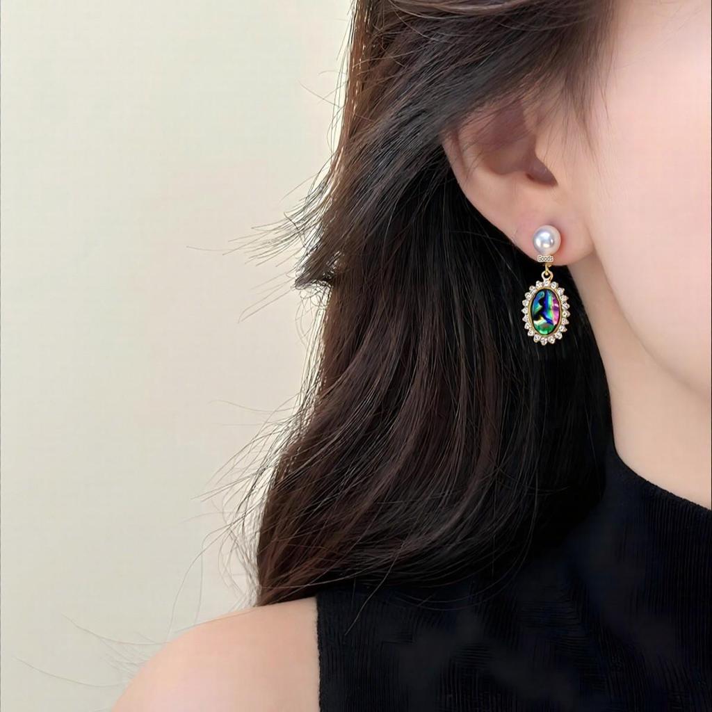 Ohrringe aus natürlichen Süßwasserperlen und ovalen Abalone-Muscheln: Stilvolle Retro-Nieten