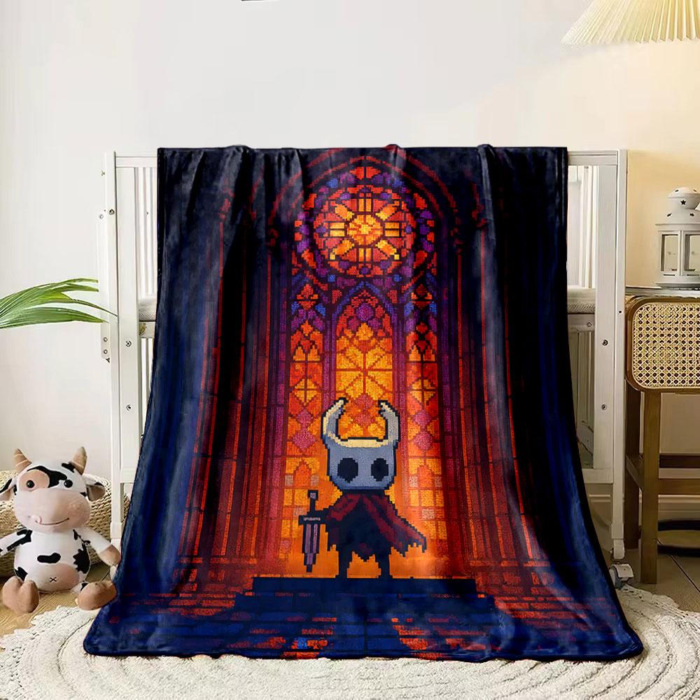 A vibrant stained glass window pattern with warm hues dominates the scene. for all seasons blanket lunch break throw gift