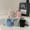 This year's popular bag 2025 new Korean version fashion hollow woven bag women's portable crossbody drawstring bucket bag