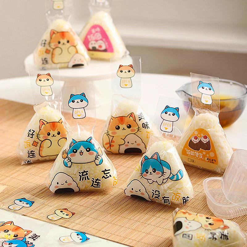 100 ks Krásný kreslený trojúhelník Balicí sáček s rýžovými kuličkami Mořské řasy Onigiri Sushi Nástroje na výrobu forem Bento Příslušenství