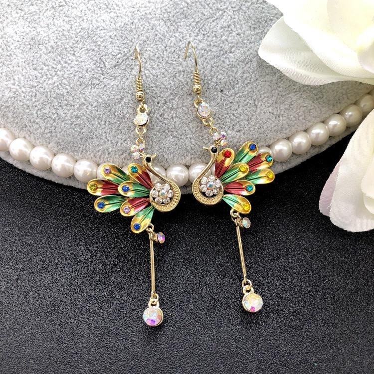 

Japan and Korea fashion light luxury diamond sandblasted fringed earrings butterfly flower earrings women s long temperament versatile ear jewelry