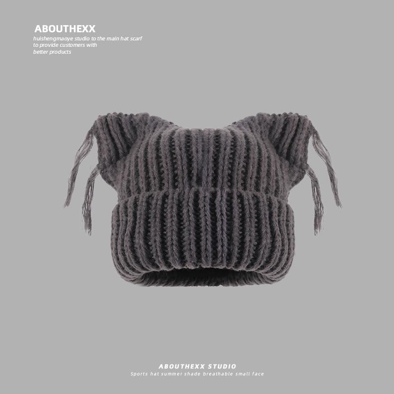 

Модная женская шерстяная шапка с кисточками и кошачьими ушками — плотная, теплая и модная вязка для осени и зимы. Medium (56-58 cm)