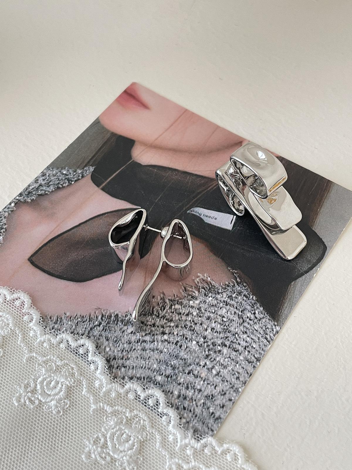 

Unique niche irregular bow stud earrings women s simple retro temperament fashion earrings niche high sense copper