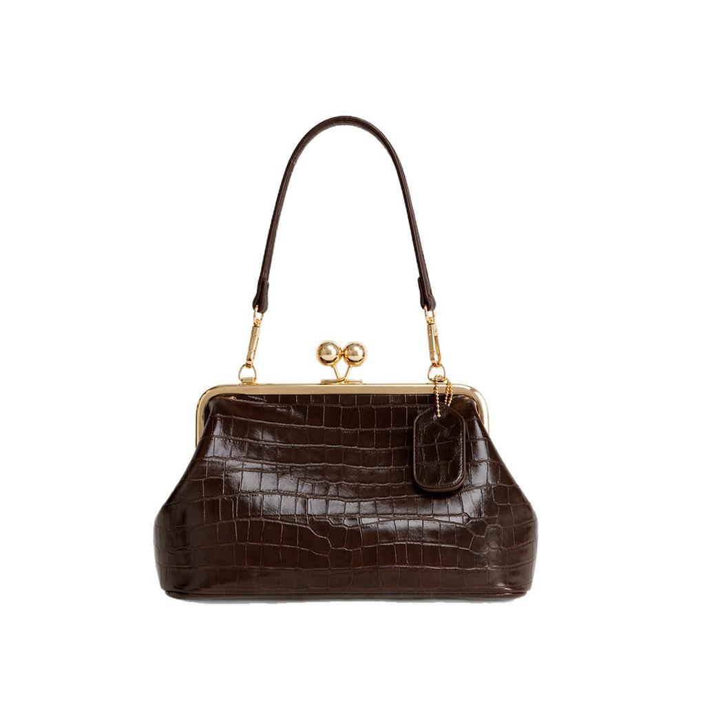 Hot sale European beautiful women bag light luxury retro fashion clip bag versatile shoulder bag metal frame handbag women