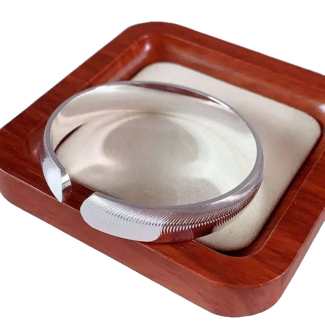 Широкий женский браслет из посеребренной мельхиоровой сетки с кошачьим глазом