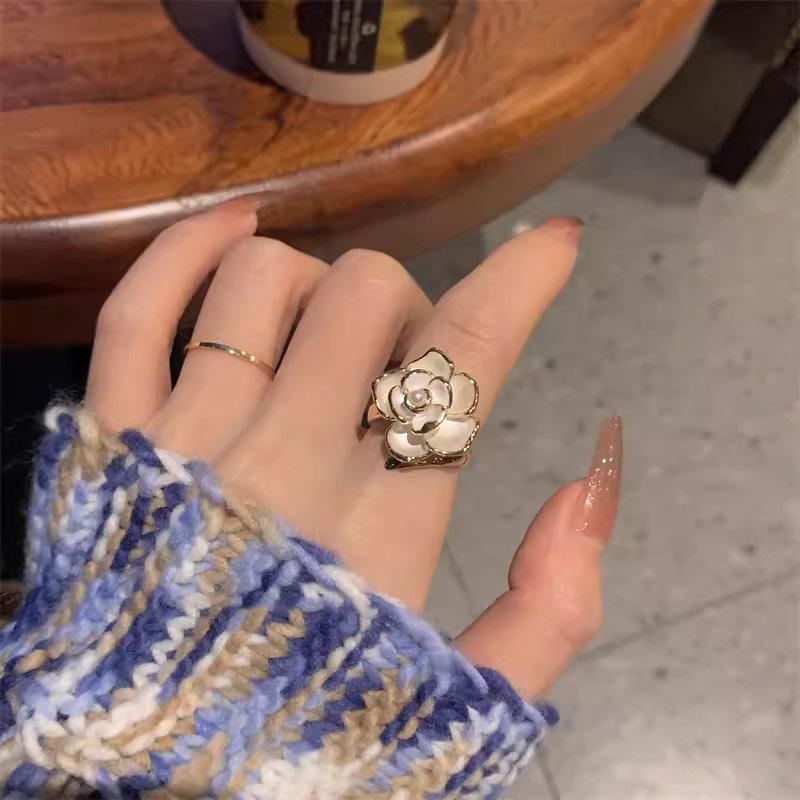 

French retro pearl camellia ring women s light luxury niche design open index finger ring high-end jewelry adjustable opening