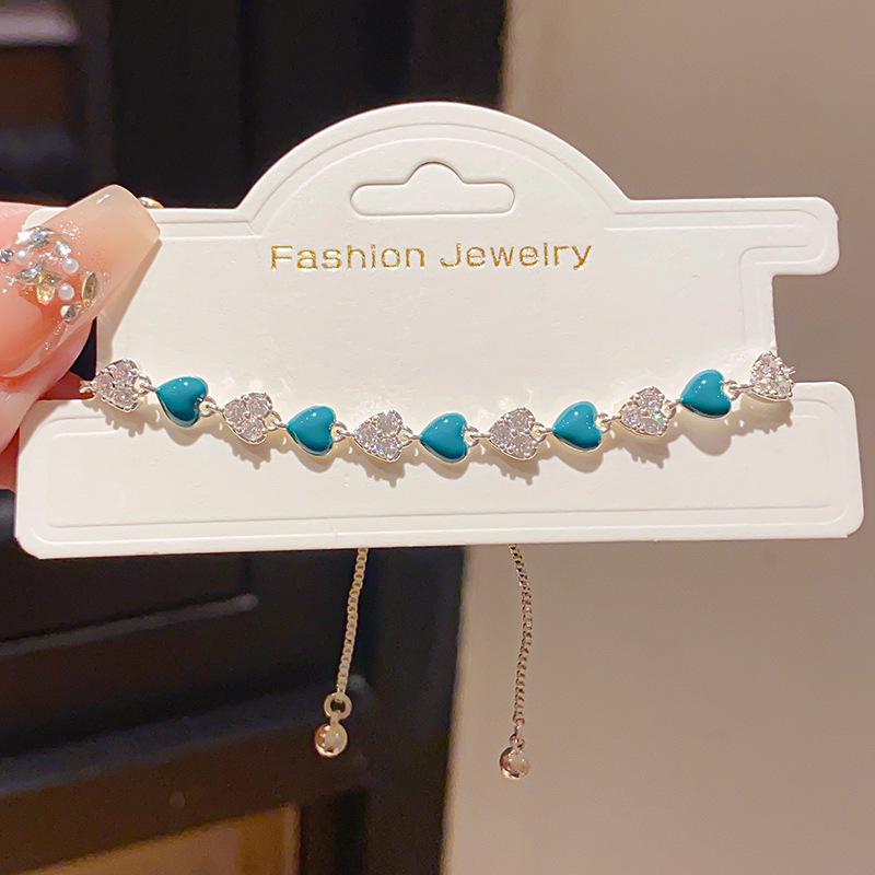 Bracciale Splice ad Olio con Cuore di Zircone – Gioiello di Moda Elegante e Versatile per Donne