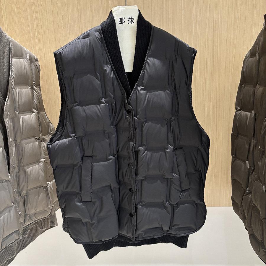 Autumn and winter loose fashion knitted splicing fake two pieces V-neck winter down vest jacket thermal vest tide