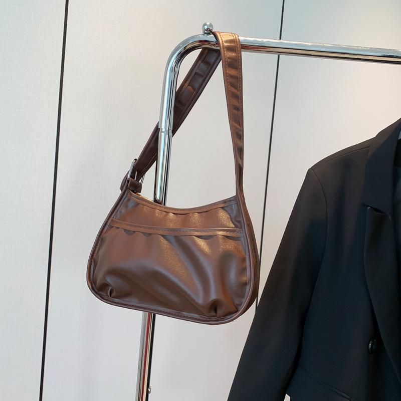 

Cloud pleated shoulder armpit bag texture popular small bag women 2025 new trendy Internet celebrity handbag casual bag коричневый