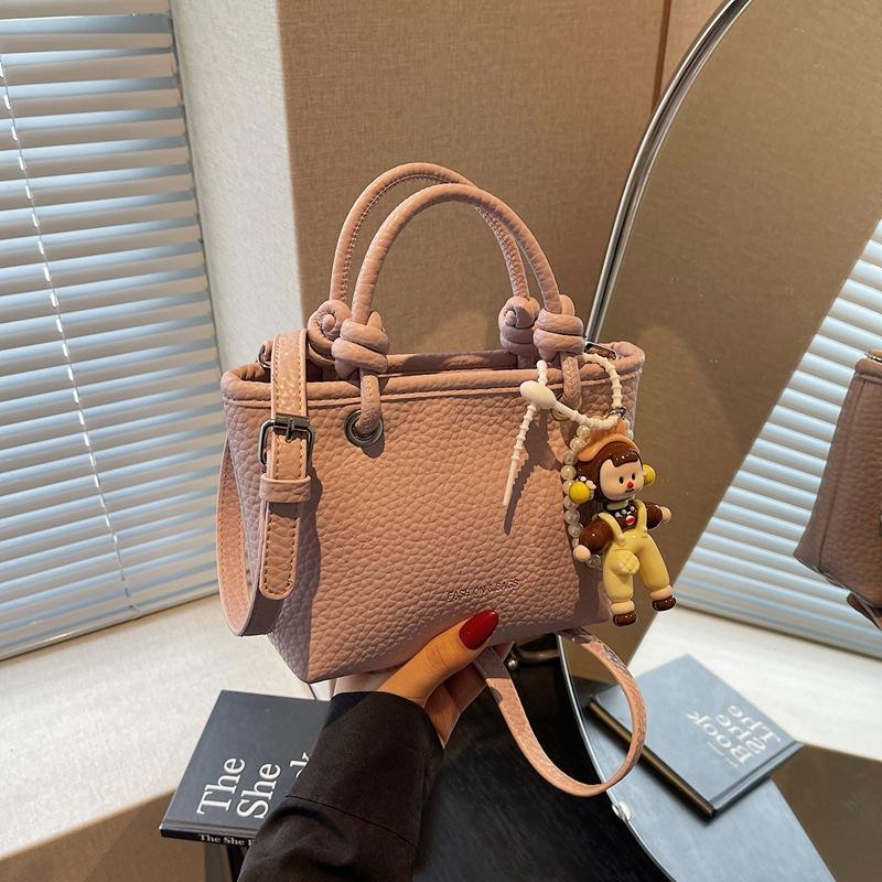 Fashion high-end hand bucket bag spring and summer simple and versatile shoulder bag trendy niche messenger bag