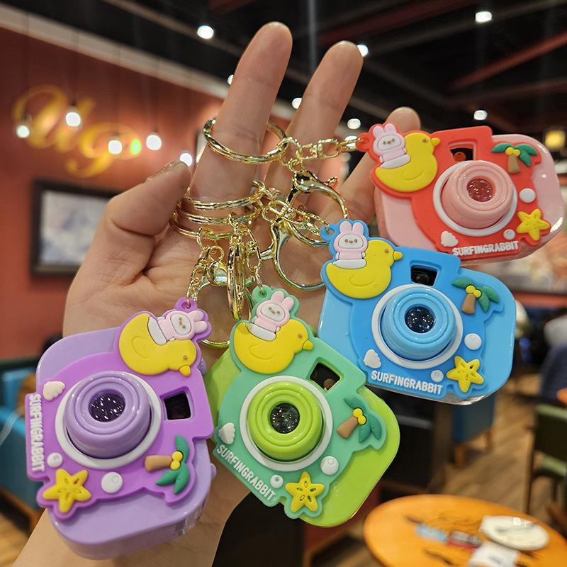 Niedliche Mini-Projektionskamera Cartoon Leuchtendes Projektionslicht Damenhandtasche Schlüsselanhänger Anhänger