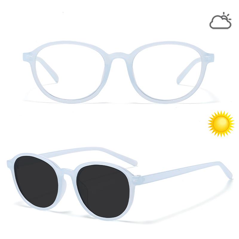 Retro Oval Blue Light Glasses with Smart Photochromic Lenses for Clear Vision and Eye Protection.