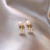 Silver Needle Zirconia Pearl Earrings: Luxurious, Fashionable, Versatile Studs with a Simple and Elegant Design.
