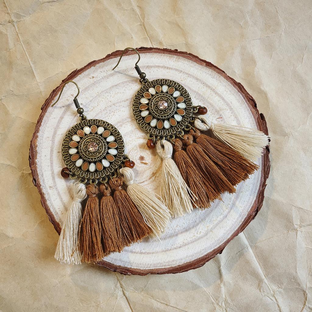Retro ethnic style woven feathers long fringed earrings, bohemian high-end hollow rice bead earrings